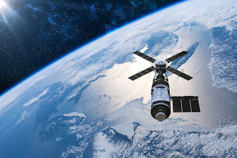 Cargo space craft Earth planet.Dark background. Sci-fi wallpaper.Space Station Orbiting Earth.Space ship.Space art wallpaper.Solar Observatory.Elements of this image furnished by NASA.3D illustration.