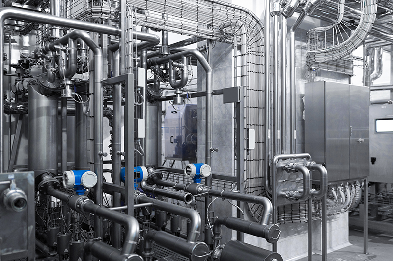 Industrial zone,The equipment of oil refining,number of electric motors with reducers. Food industry. Details distribution system of a modern brewery. Equipment and industrial tools